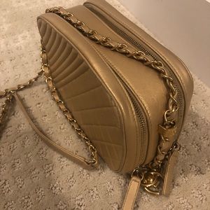 Chanel gold camera bag